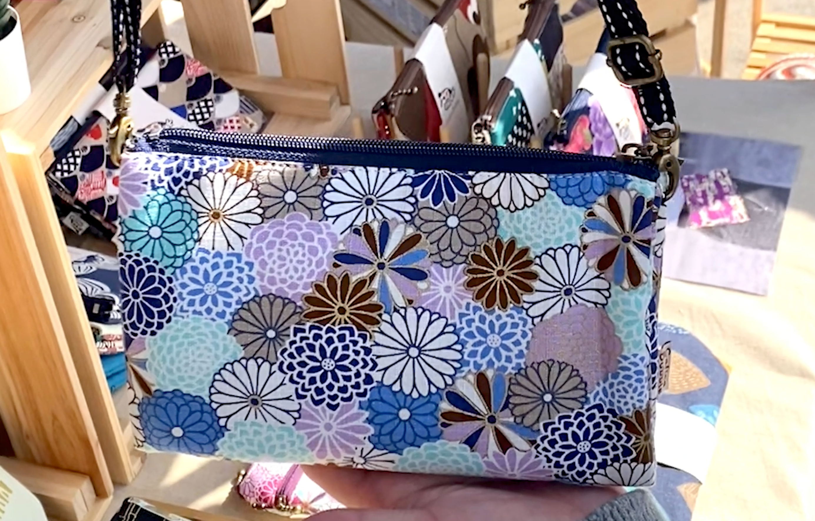 Load video: Calico Bubble Everything Pouch